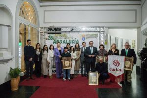 Cáritas y la empresa cárnica Intemaq reciben reconocimientos del Ayuntamiento de Carmona en conmemoración del 28F